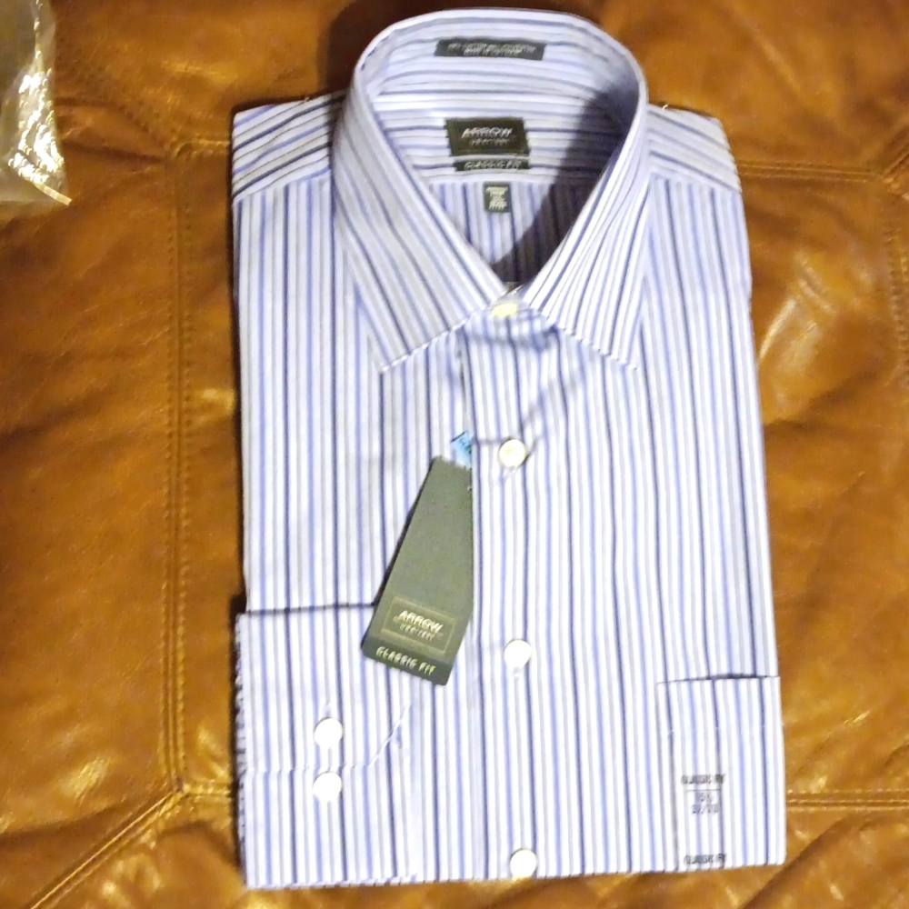 4 ARROW SHIRTS. ALL BRAND NEW WITH TAGS. ALL SIZE 15 1/2, 32-33.